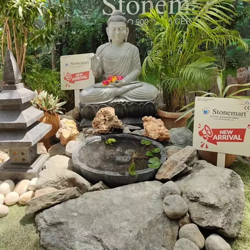 How to Create a Zen Garden Using a Buddha Statue?